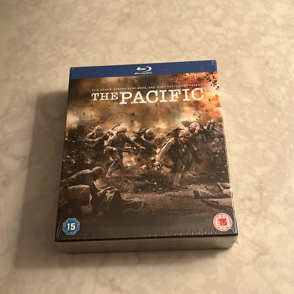 NEW IN PLASTIC “The Pacific” blue-ray boxed disc set.  Perfect Gift